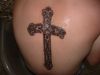 cross tattoo  on hip